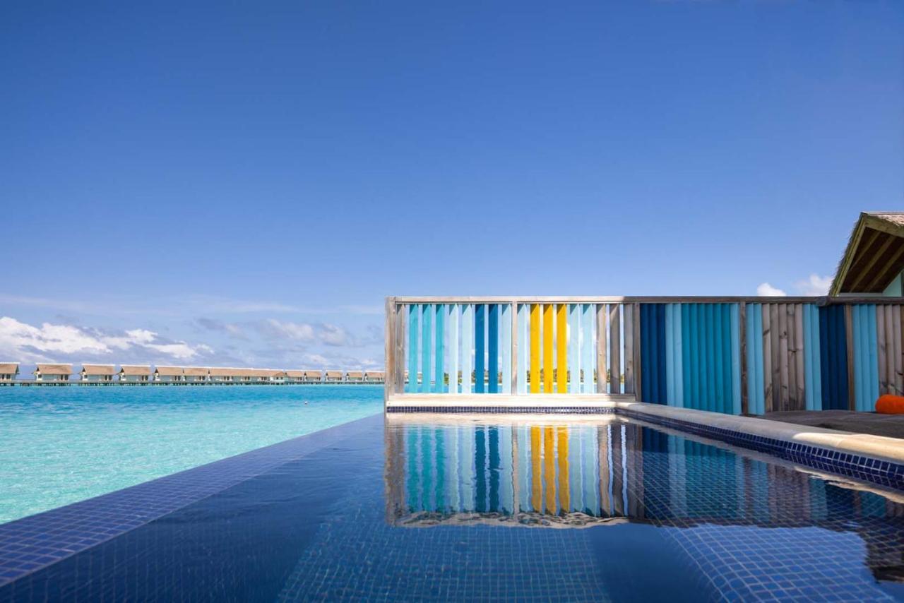 فندق هارد روك مالديفز Emboodhoo Lagoon المظهر الخارجي الصورة The swimming pool at the resort