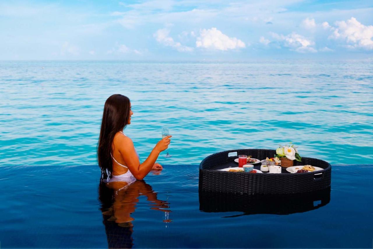 فندق هارد روك مالديفز Emboodhoo Lagoon المظهر الخارجي الصورة Floating breakfast at a resort in Maldives
